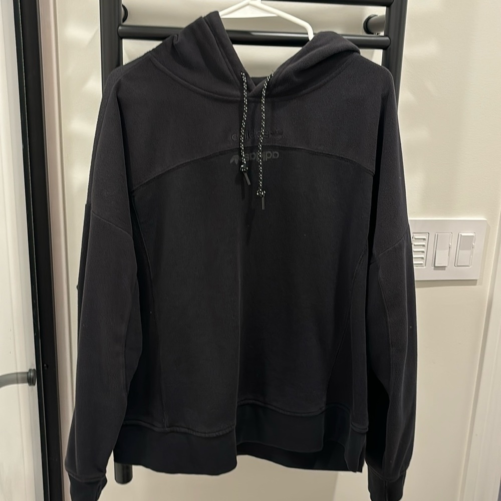 Black hoodie. The polar top. Oversize, unisex
